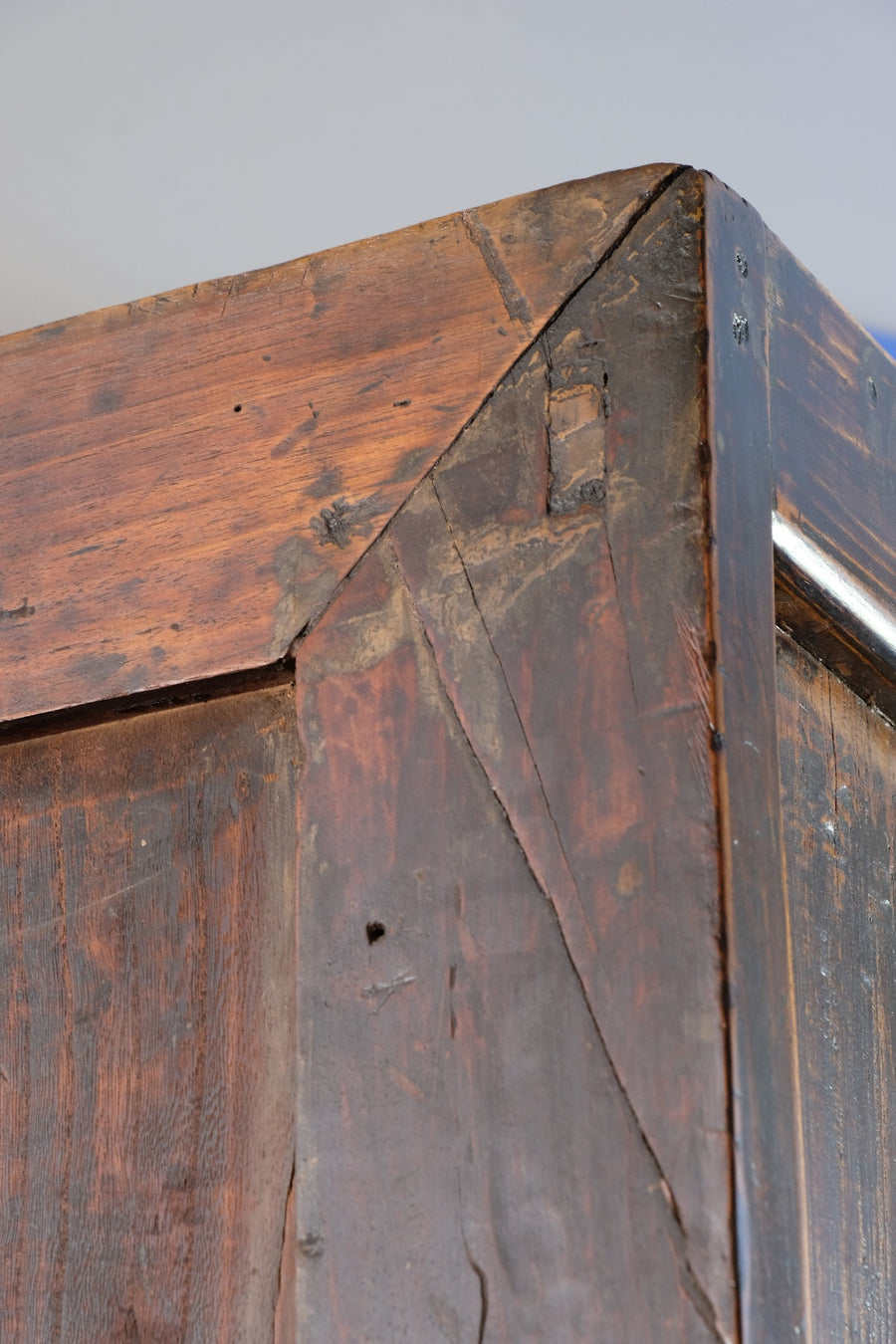 Close-up of antique Chinese storage drawers with hand-painted calligraphy
