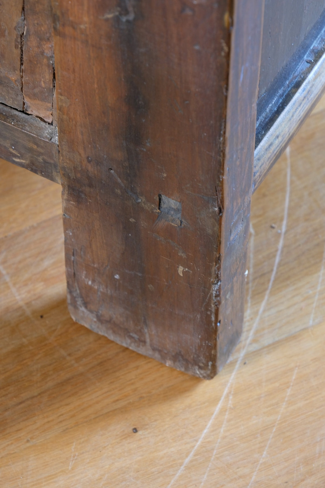 Detail of hand-painted Chinese calligraphy on antique wooden drawers