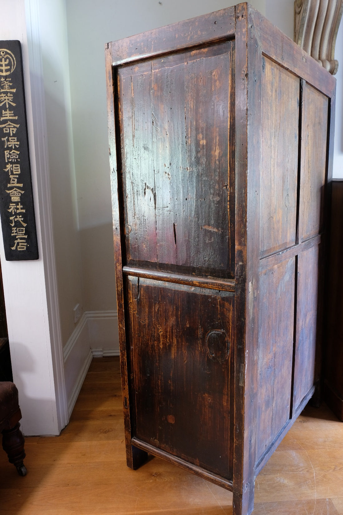 side view Painted Chinese bank of 57 drawers with hand-painted calligraphy