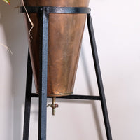 Large Victorian copper conical planter on cast iron stand