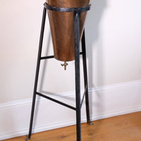 Large Victorian copper conical planter on cast iron stand
