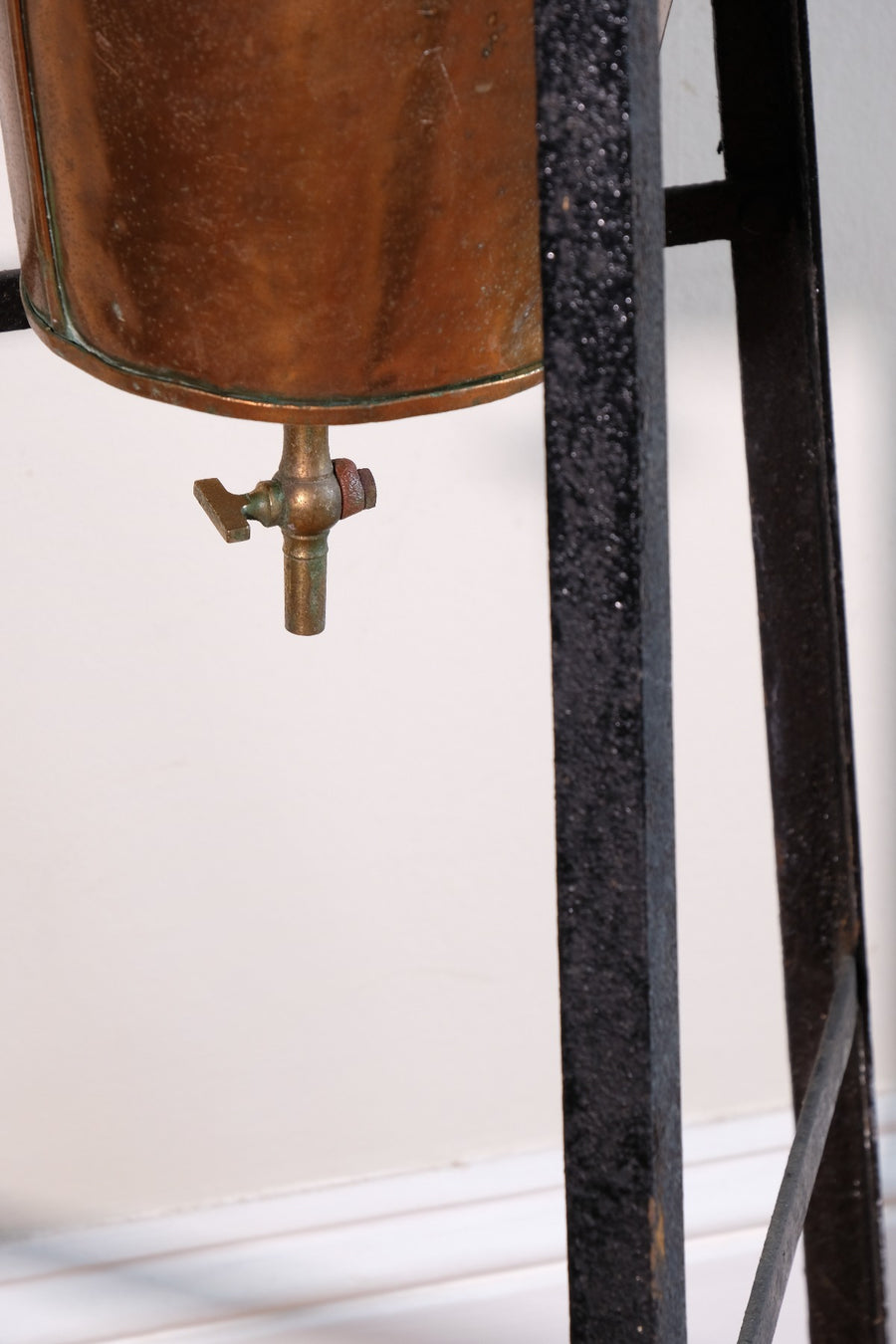 Large Victorian copper conical planter on cast iron stand