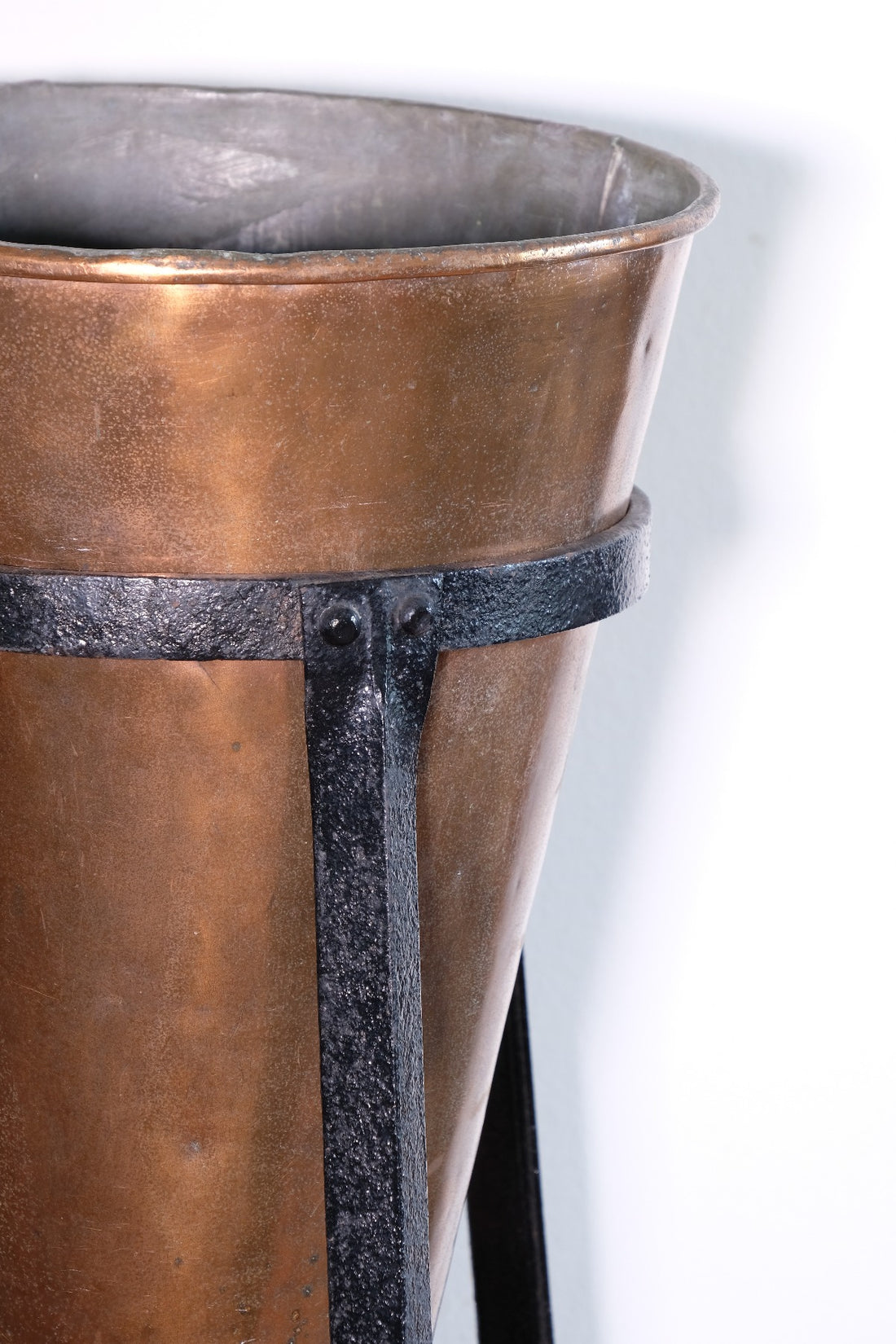 Large Victorian copper conical planter on cast iron stand
