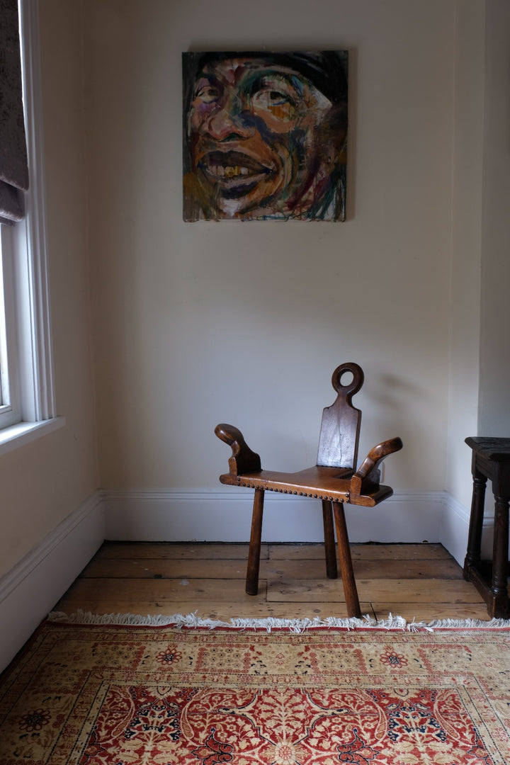 1950s Spanish Brutalist primitive elm leather chair front view
