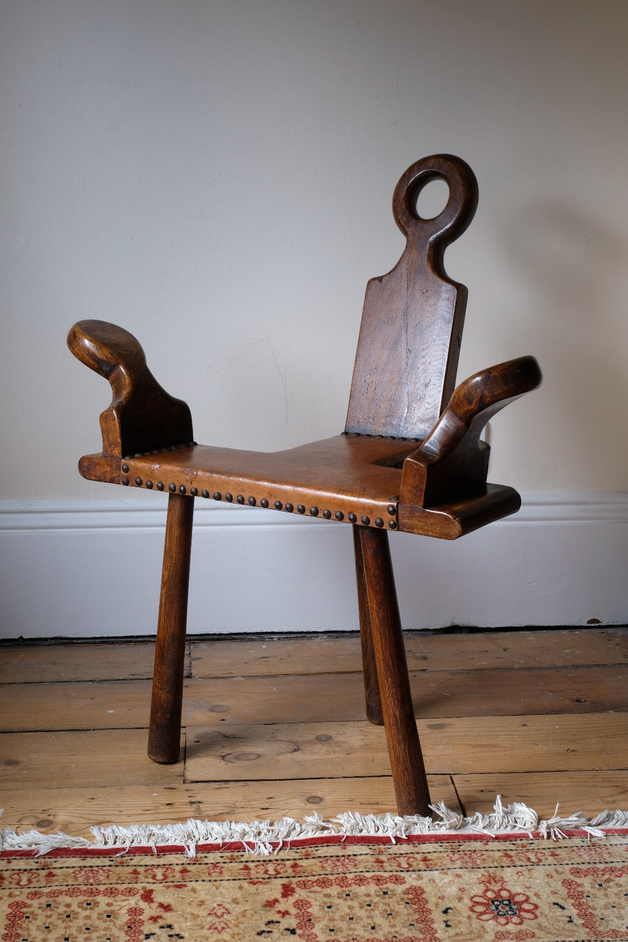 1950s Spanish Brutalist primitive elm leather chair front view