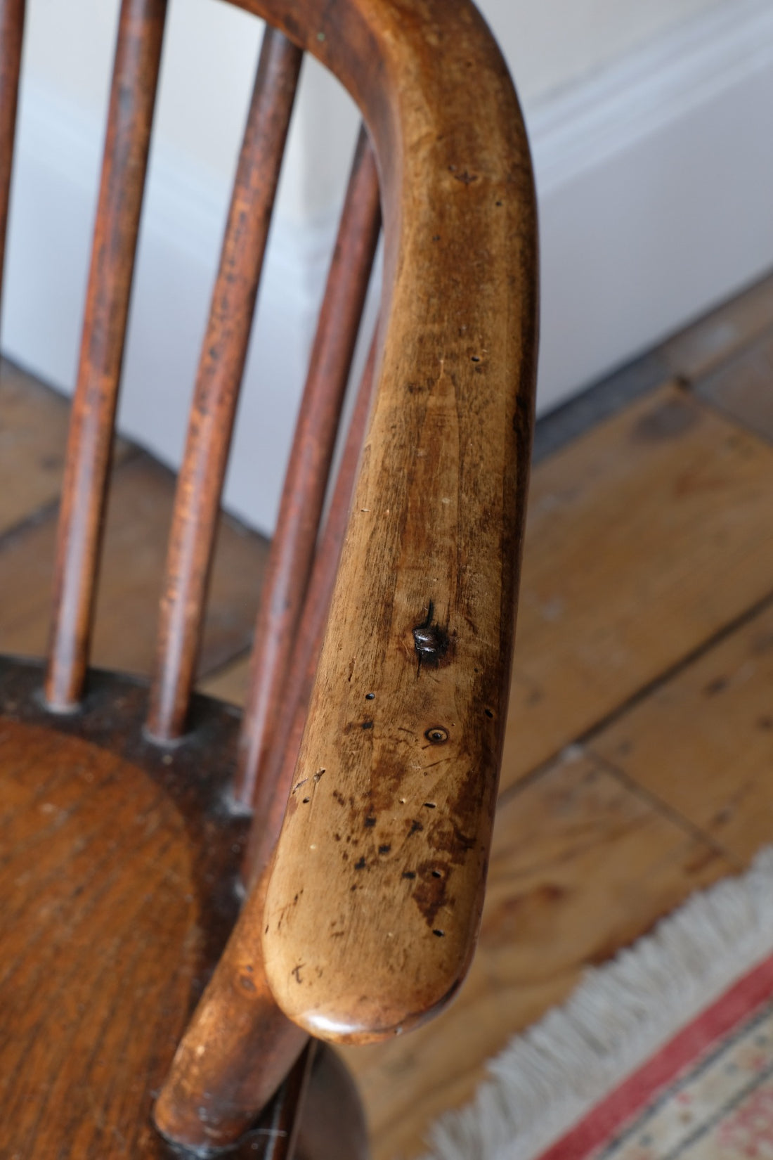 close up of a 19th Century Windsor Wheelback Armchair in Ash & Elm