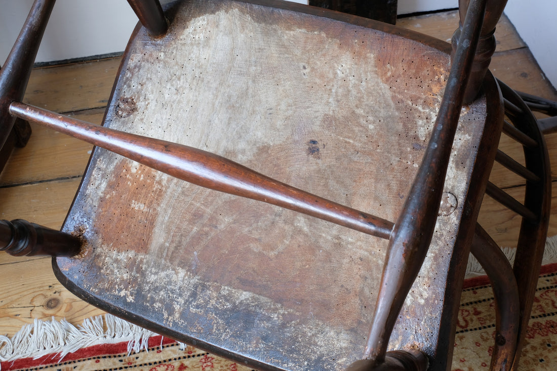 underneath of the seat of a 19th Century Windsor Wheelback Armchair in Ash & Elm