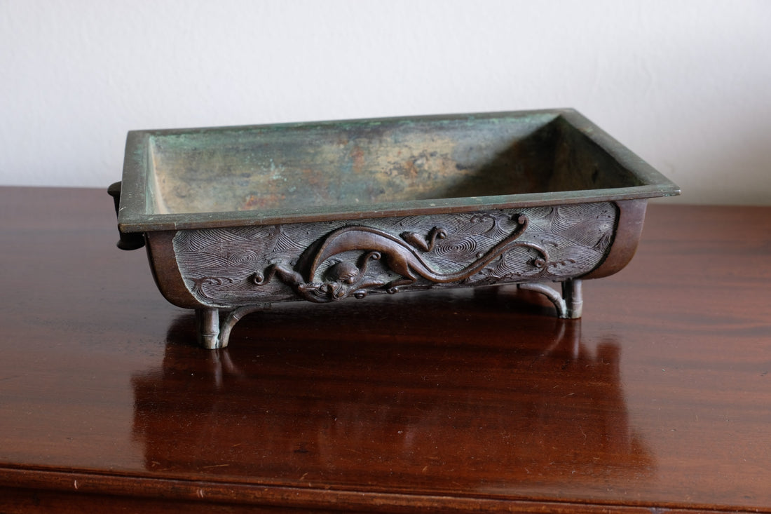 Top view of Meiji-period Japanese bronze suiban vessel showing patina and form
