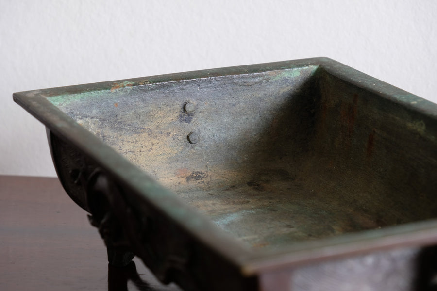 Top view of Meiji-period Japanese bronze suiban vessel showing patina and form