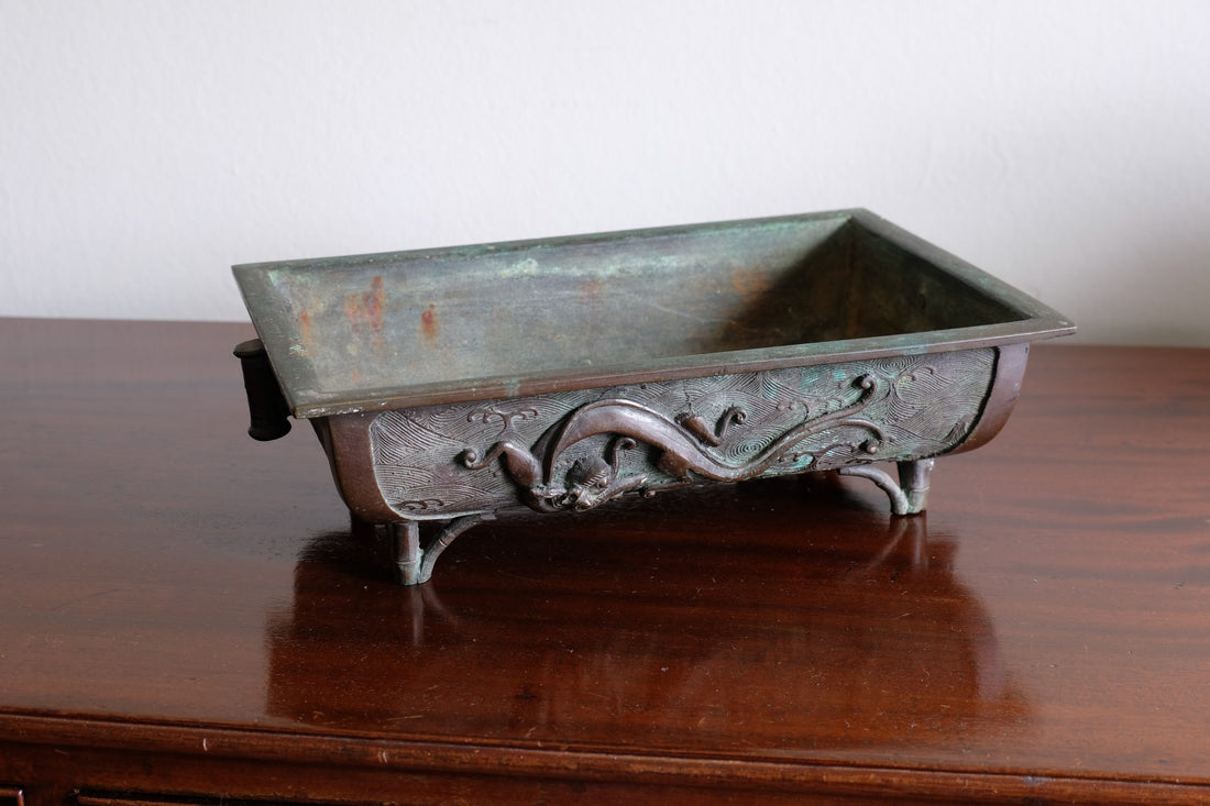 Top view of Meiji-period Japanese bronze suiban vessel showing patina and form