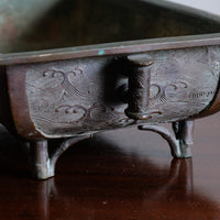 Antique Meiji Japanese bronze suiban vessel by Tōun-sai with dragon relief