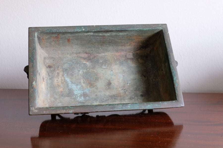 Top view of Meiji-period Japanese bronze suiban vessel showing patina and form