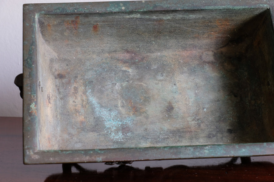 Top view of Meiji-period Japanese bronze suiban vessel showing patina and form