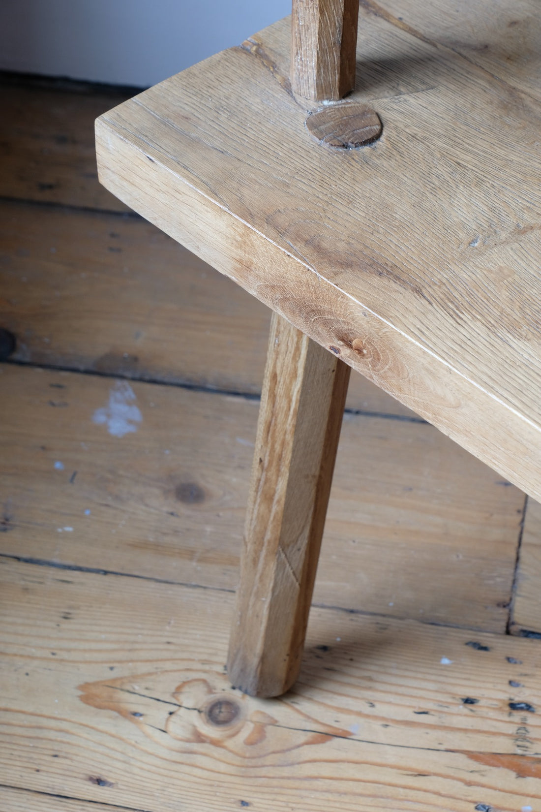Leg Close up - Primitive handmade wooden armchair with rustic timber finish and blocky carved design