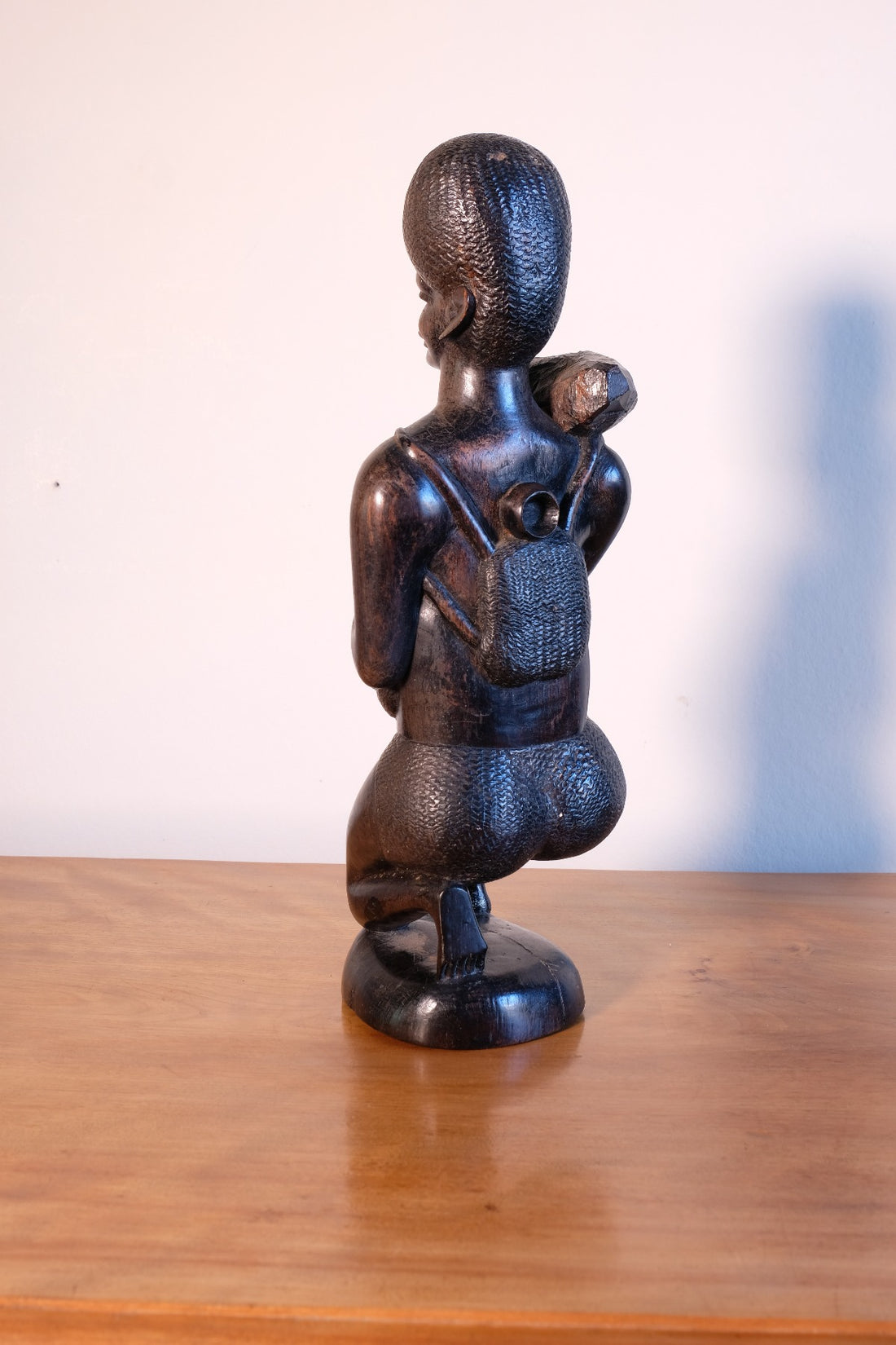 Kenyan ebony wood carving kneeling mother with child bundle