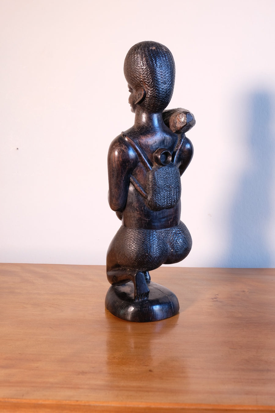 Kenyan ebony wood carving kneeling mother with child bundle