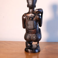 Kenyan ebony wood carving kneeling mother with child bundle