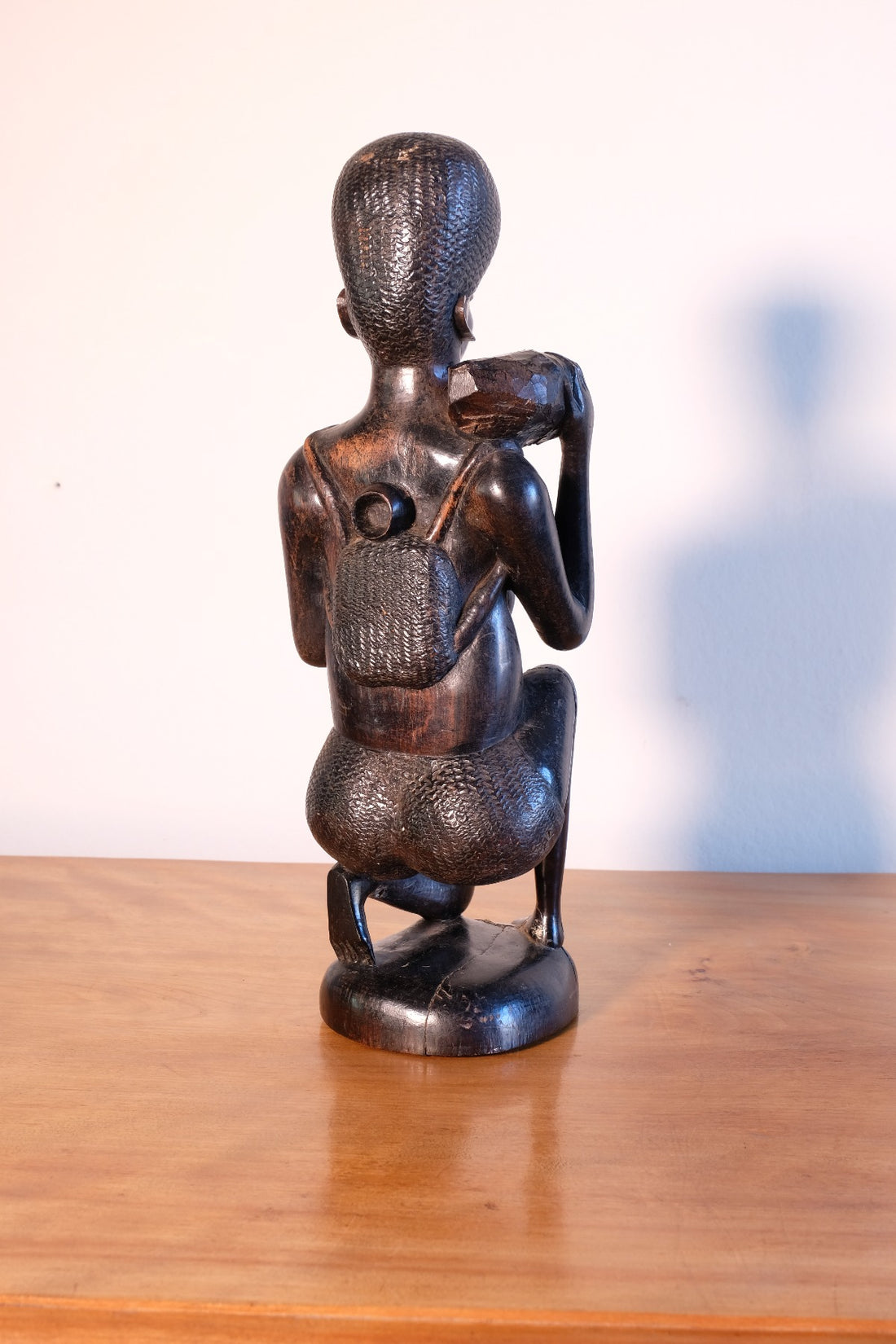Kenyan ebony wood carving kneeling mother with child bundle