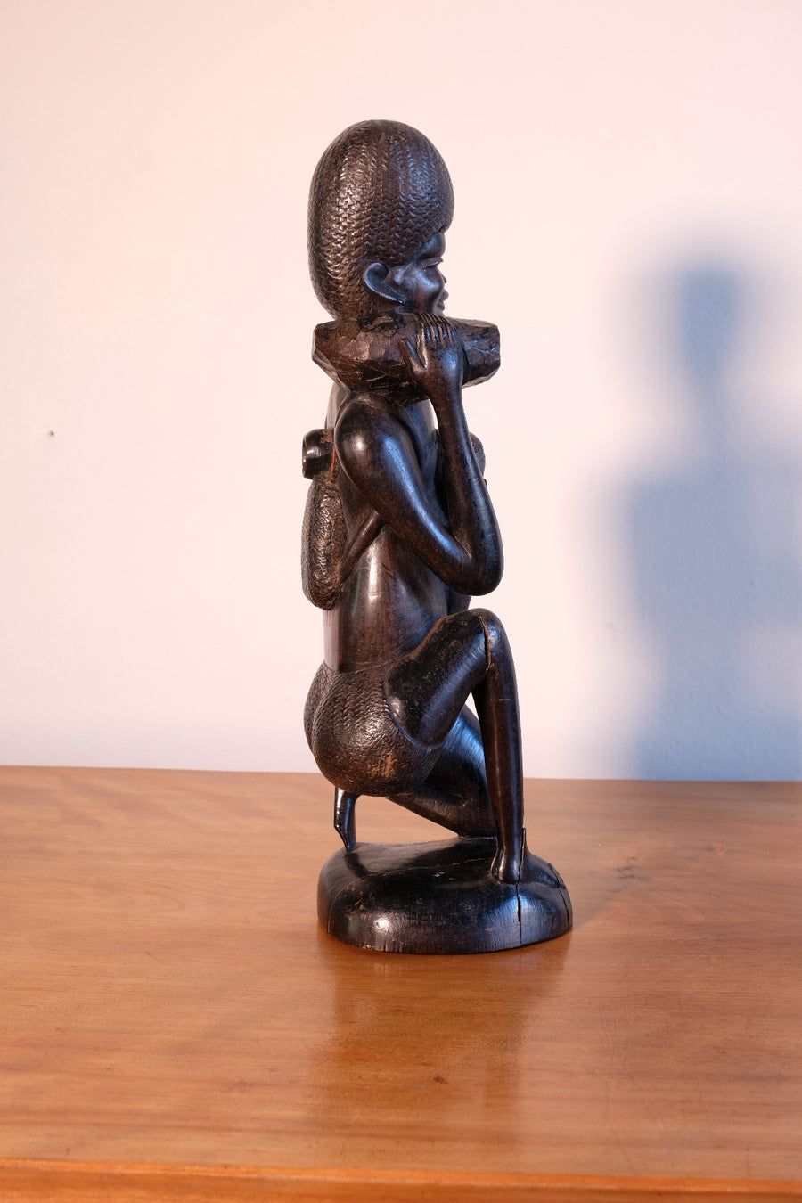 Kenyan ebony wood carving kneeling mother with child bundle