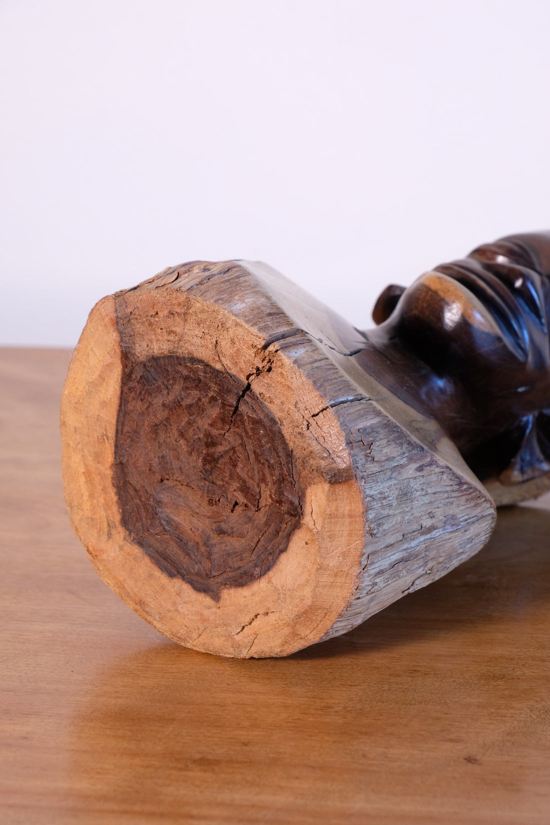 Close up of the natural timber base of a Hand-Carved Makonde Wood Bust face, East African Tribal Sculpture