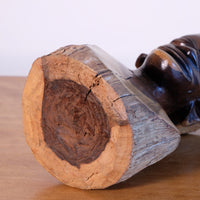 Close up of the natural timber base of a Hand-Carved Makonde Wood Bust face, East African Tribal Sculpture