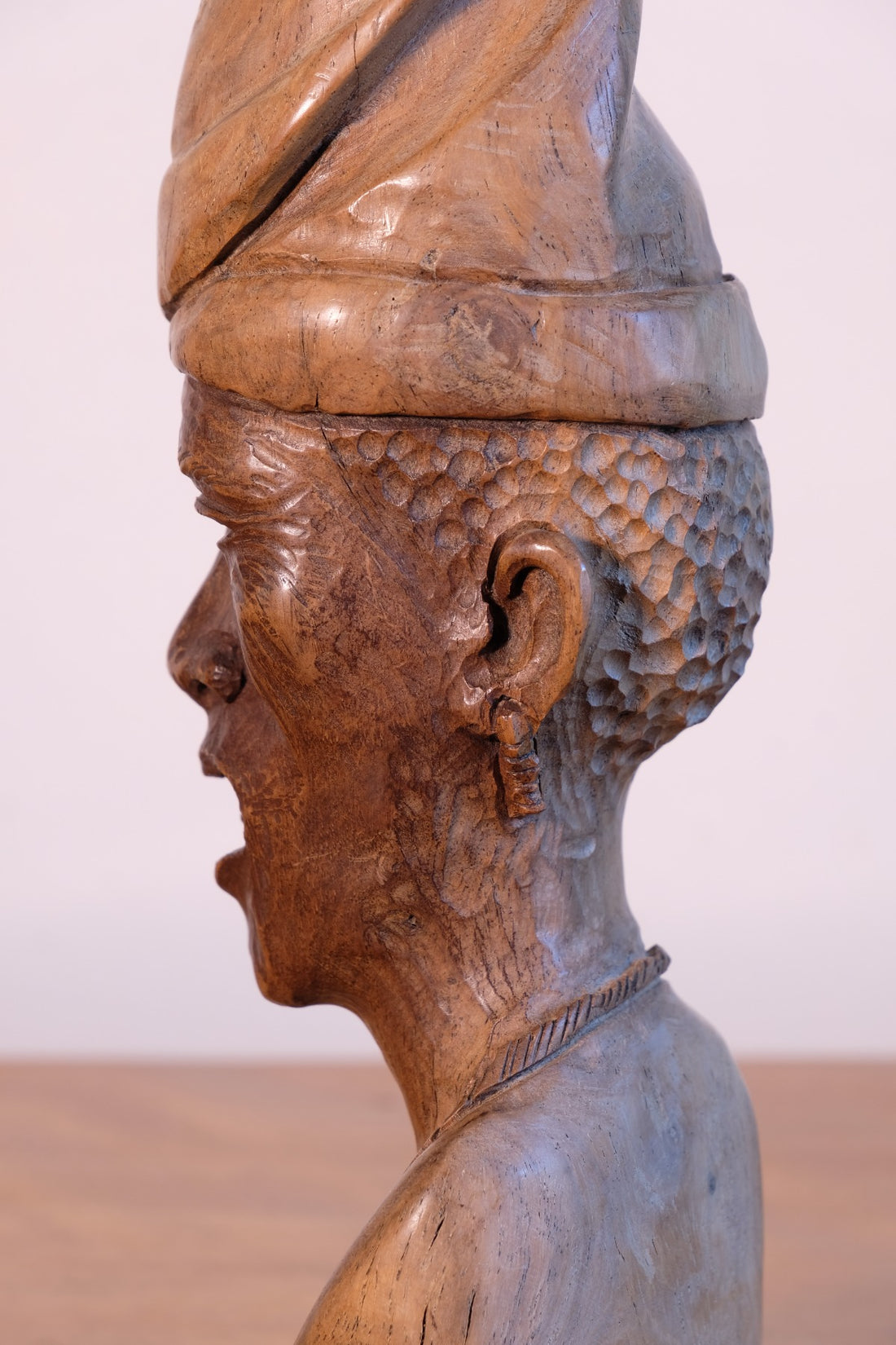 close up of the side profile of a African Hand-Carved Wooden Bust Sculpture – Vintage Tribal Portrait Art (24.5cm)