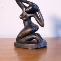 Mid century modernist carved wooden kneeling female nude sculpture with ebonised finish