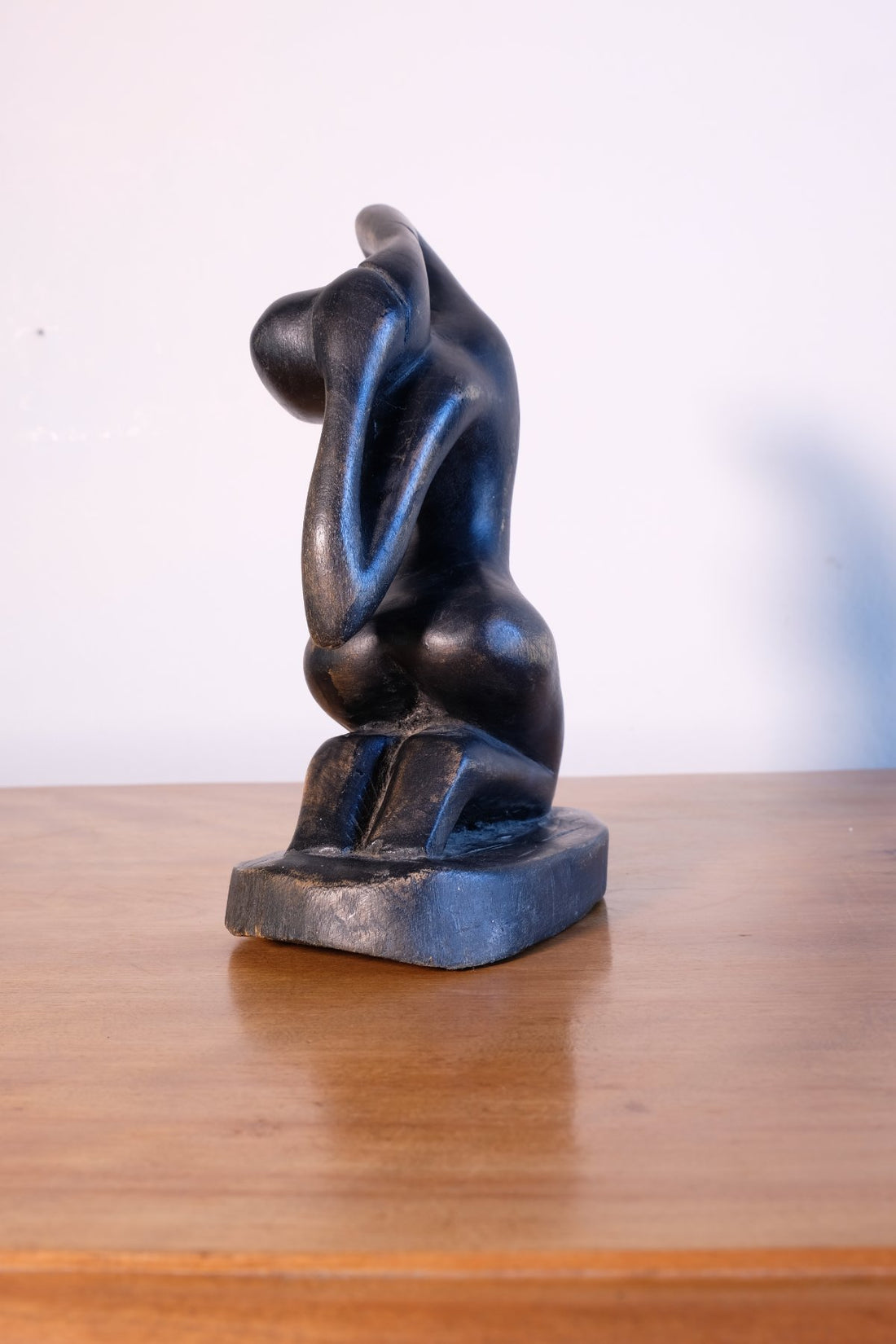 Mid century modernist carved wooden kneeling female nude sculpture with ebonised finish