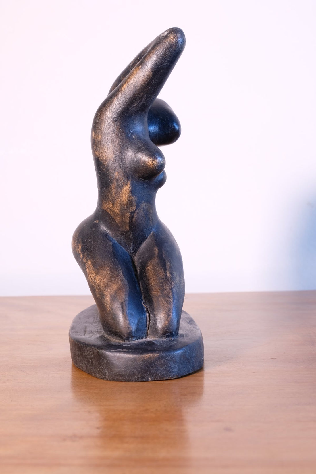 Mid century modernist carved wooden kneeling female nude sculpture with ebonised finish