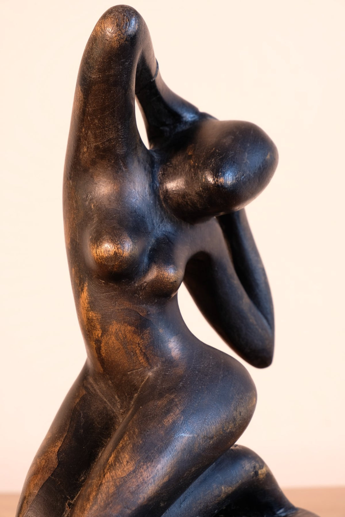 Mid century modernist carved wooden kneeling female nude sculpture with ebonised finish