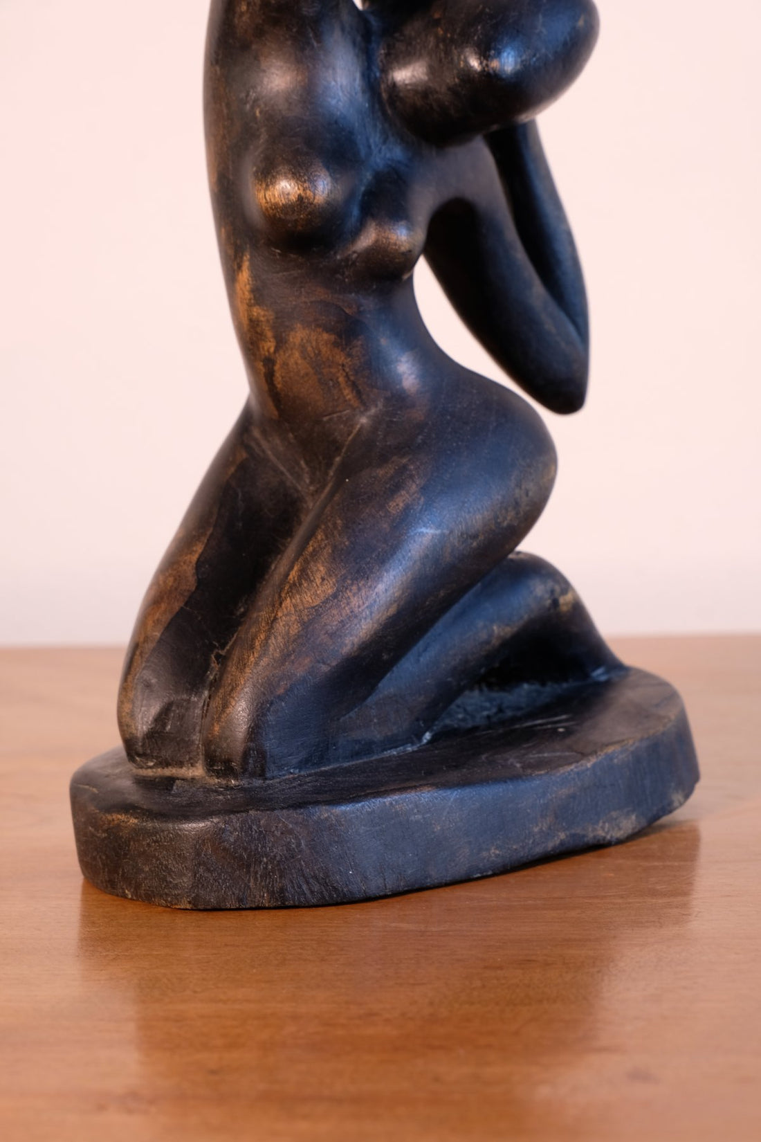 Mid century modernist carved wooden kneeling female nude sculpture with ebonised finish