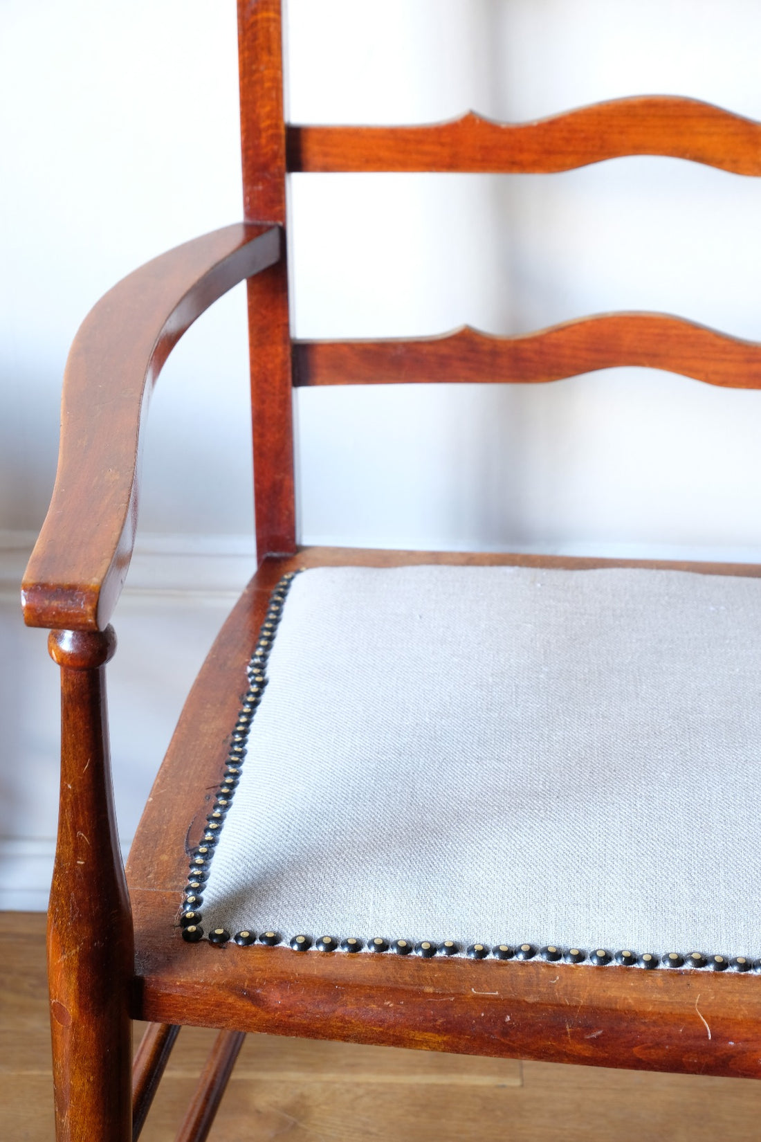 serpentine arms of the 19th century English vernacular furniture bench