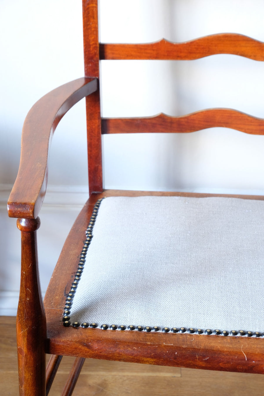 serpentine arms of the 19th century English vernacular furniture bench