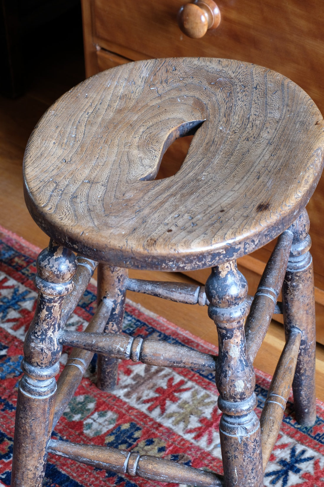 Top of Antique Victorian Elm Stool With Oval Top And Turned Legs Circa 1860