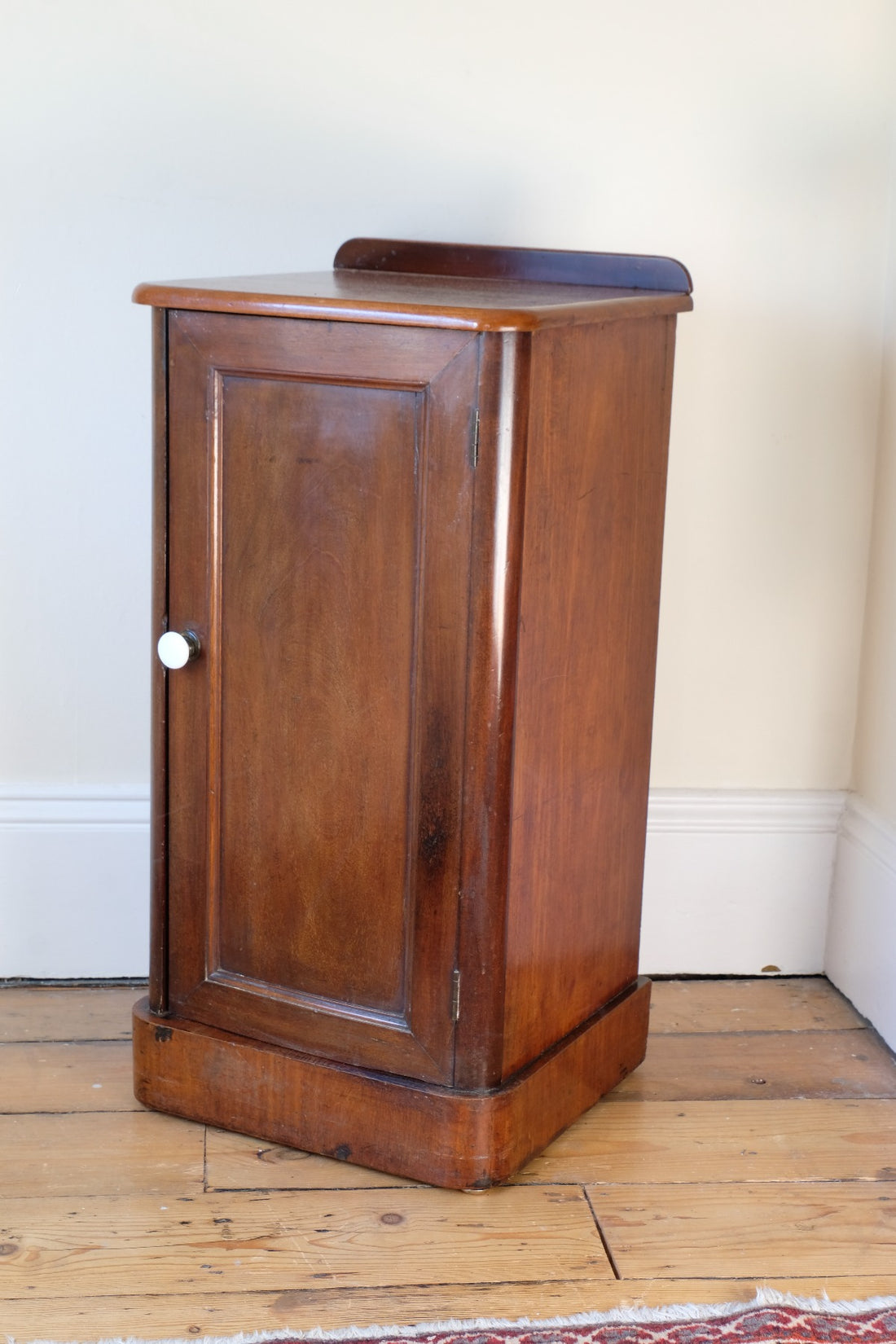 corner view 19th Century Mahogany Bedside Cupboard with Single Door & Curved Corners