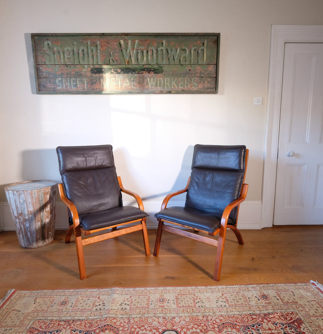 Pair of 1970s Danish Stouby bentwood leather lounge chairs with sculptural oak frames