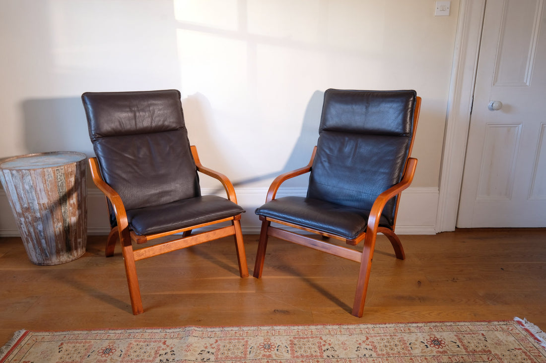 Pair of 1970s Danish Stouby bentwood leather lounge chairs with sculptural oak frames