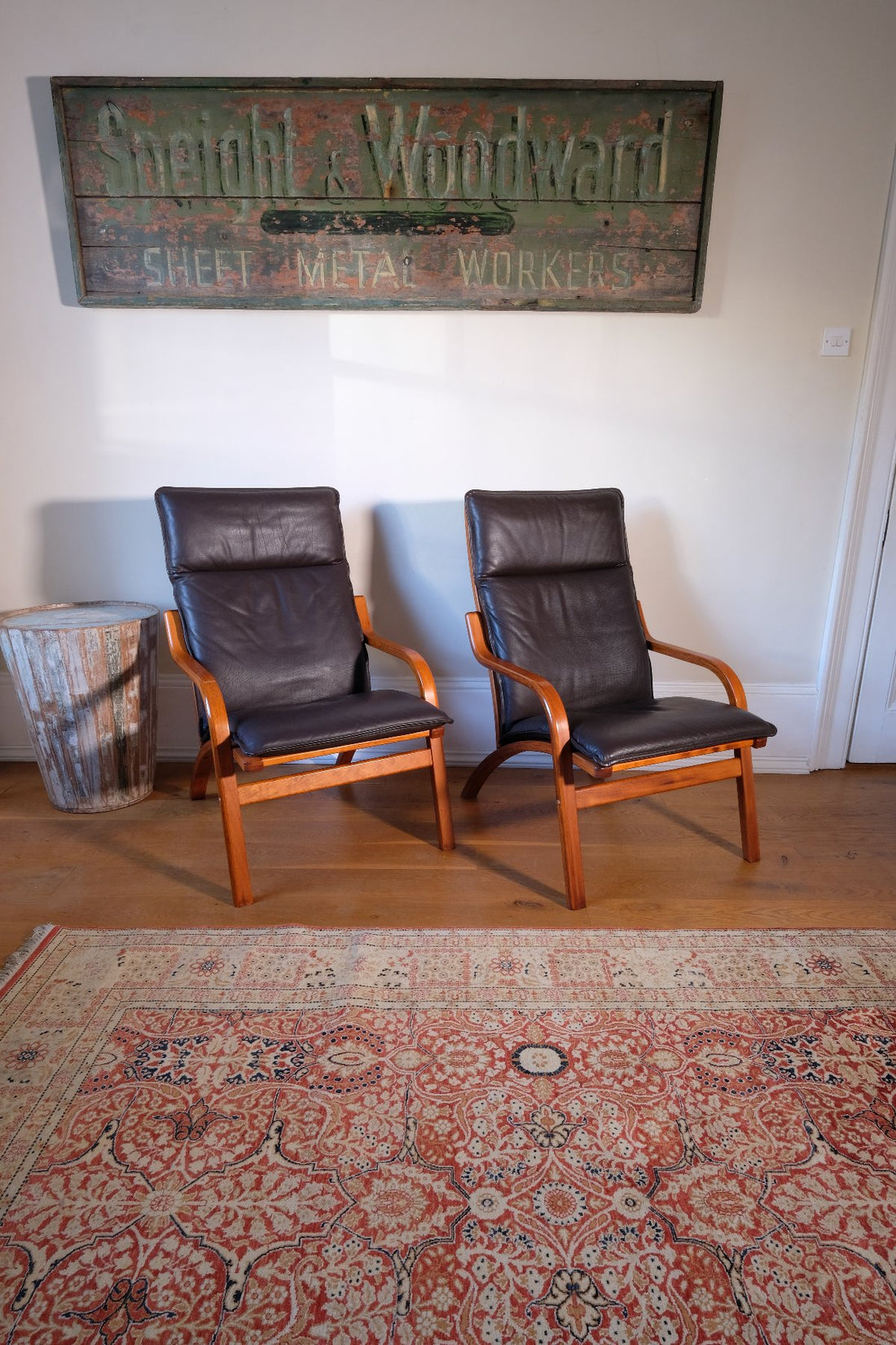 Pair of 1970s Danish Stouby bentwood leather lounge chairs with sculptural oak frames