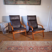 Pair of 1970s Danish Stouby bentwood leather lounge chairs with sculptural oak frames