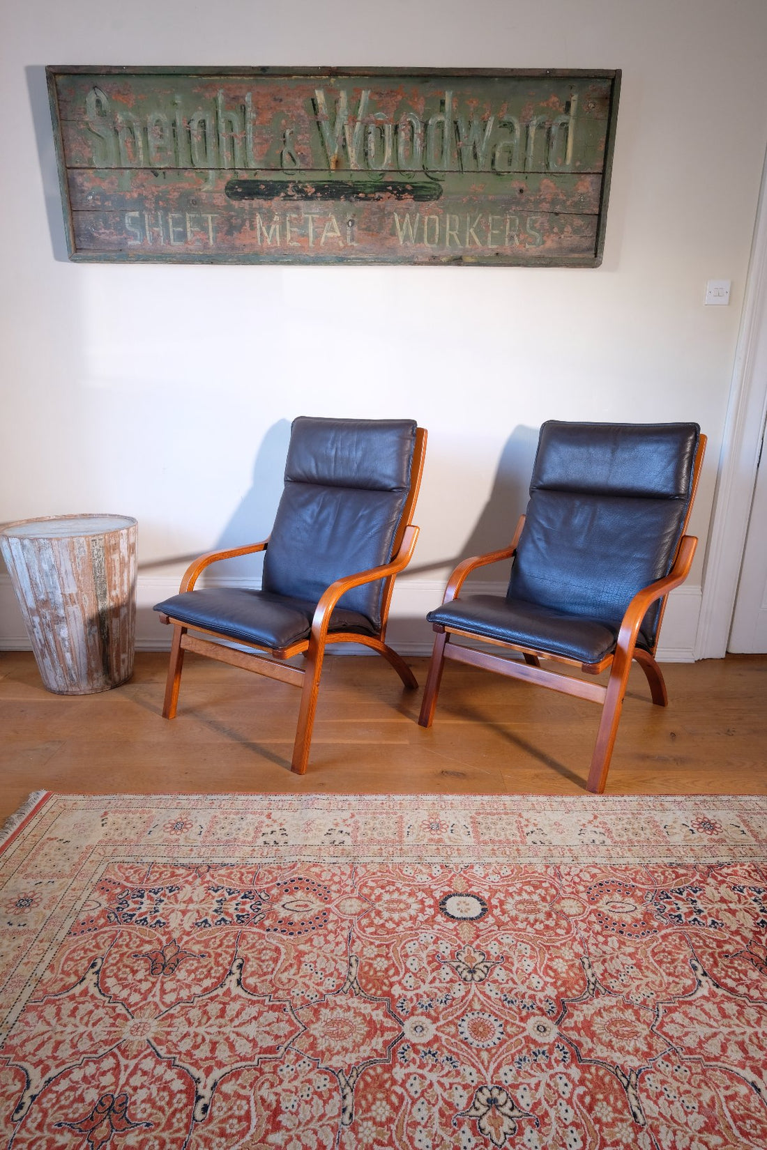 Pair of 1970s Danish Stouby bentwood leather lounge chairs with sculptural oak frames