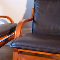 close up of the leather grain on a  1970s Danish Stouby bentwood leather lounge chairs with sculptural oak frame Pair of 1970s Danish Stouby bentwood leather lounge chairs with sculptural oak frame