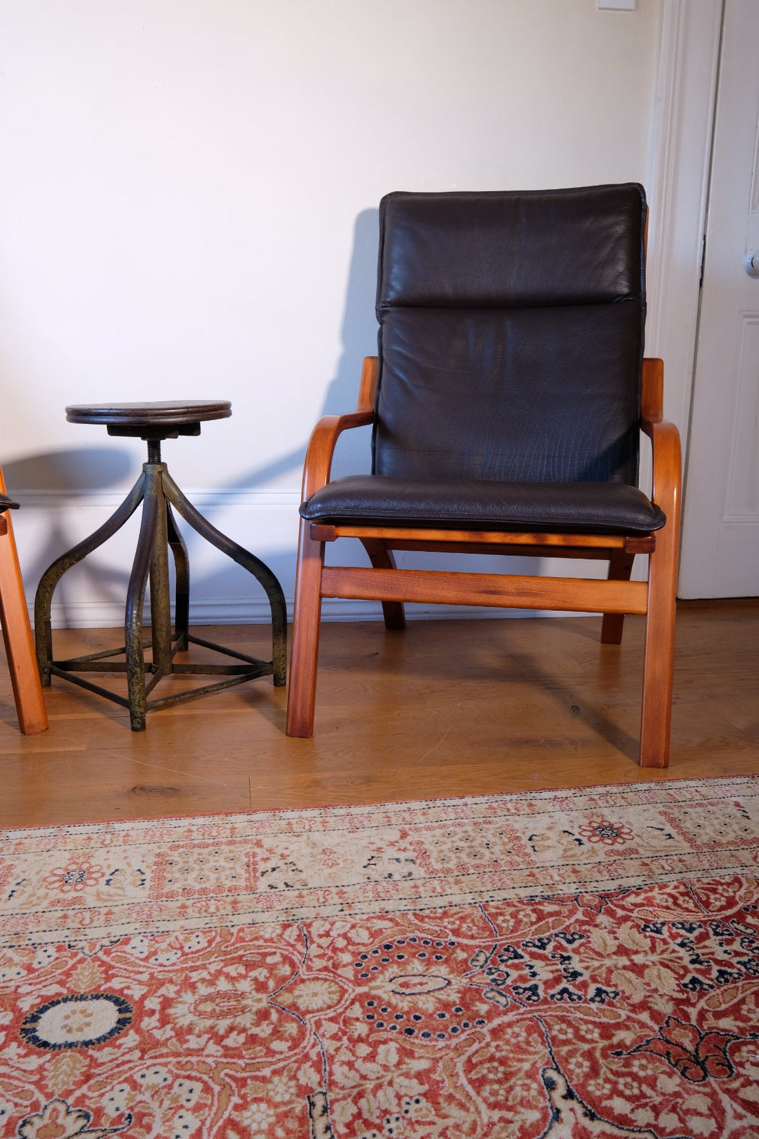 An Industrial Swivel Stool, Circa 1950 with a Stouby lounge chair