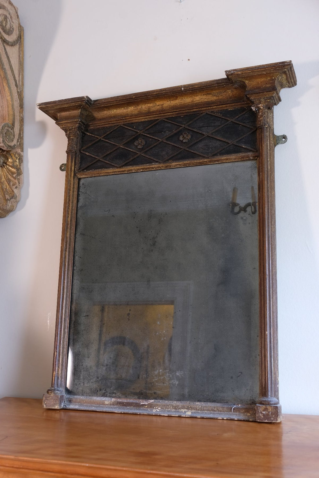 Regency pier mirror with original foxed bevelled glass and giltwood frame circa 1820s