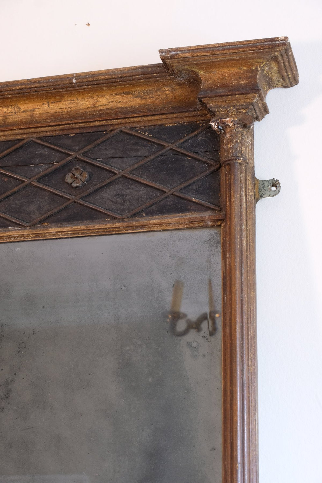 Regency pier mirror with original foxed bevelled glass and giltwood frame circa 1820s