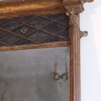 Regency pier mirror with original foxed bevelled glass and giltwood frame circa 1820s