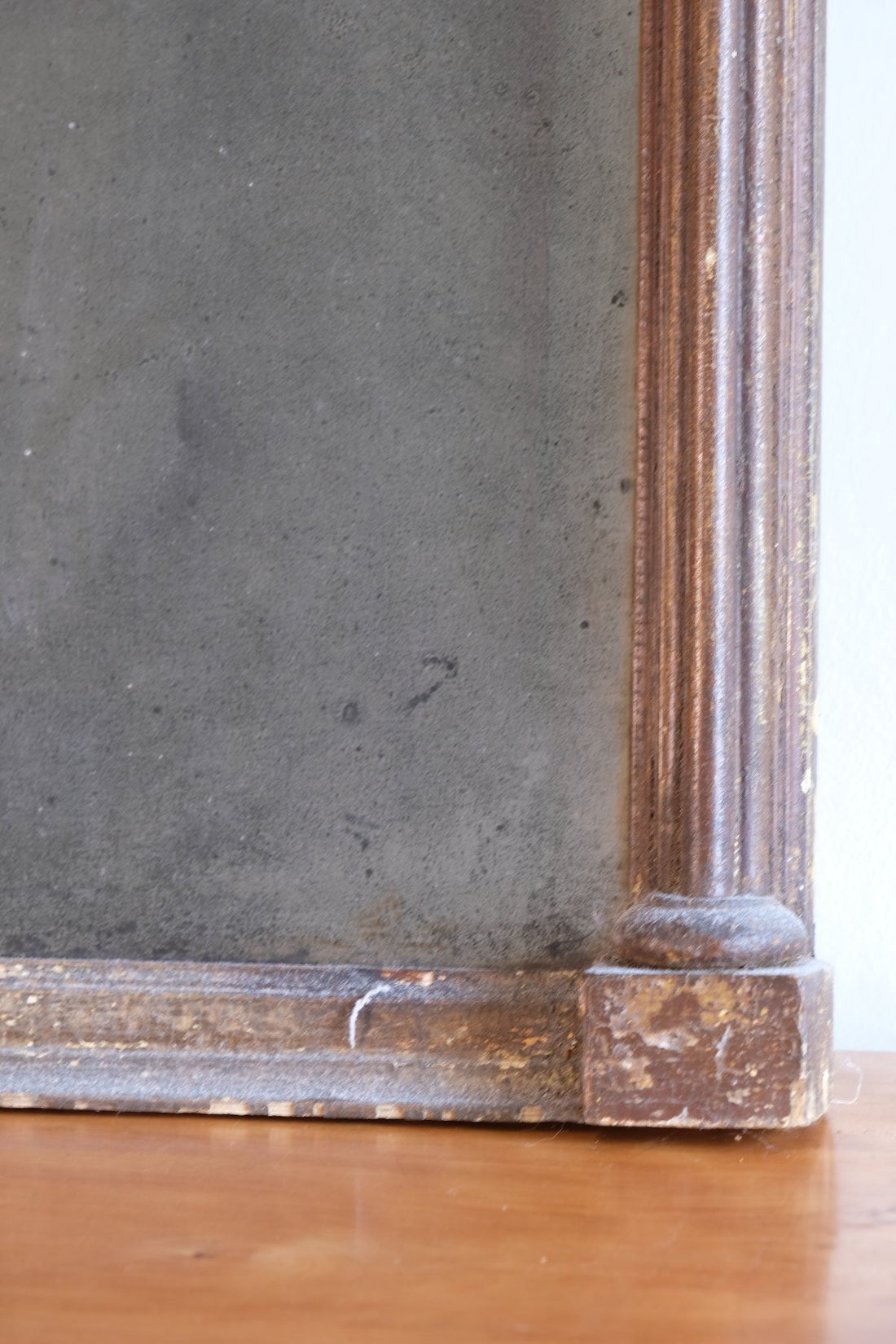 Regency pier mirror with original foxed bevelled glass and giltwood frame circa 1820s