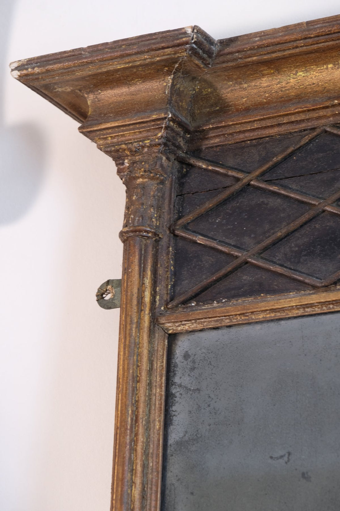 Regency pier mirror with original foxed bevelled glass and giltwood frame circa 1820s