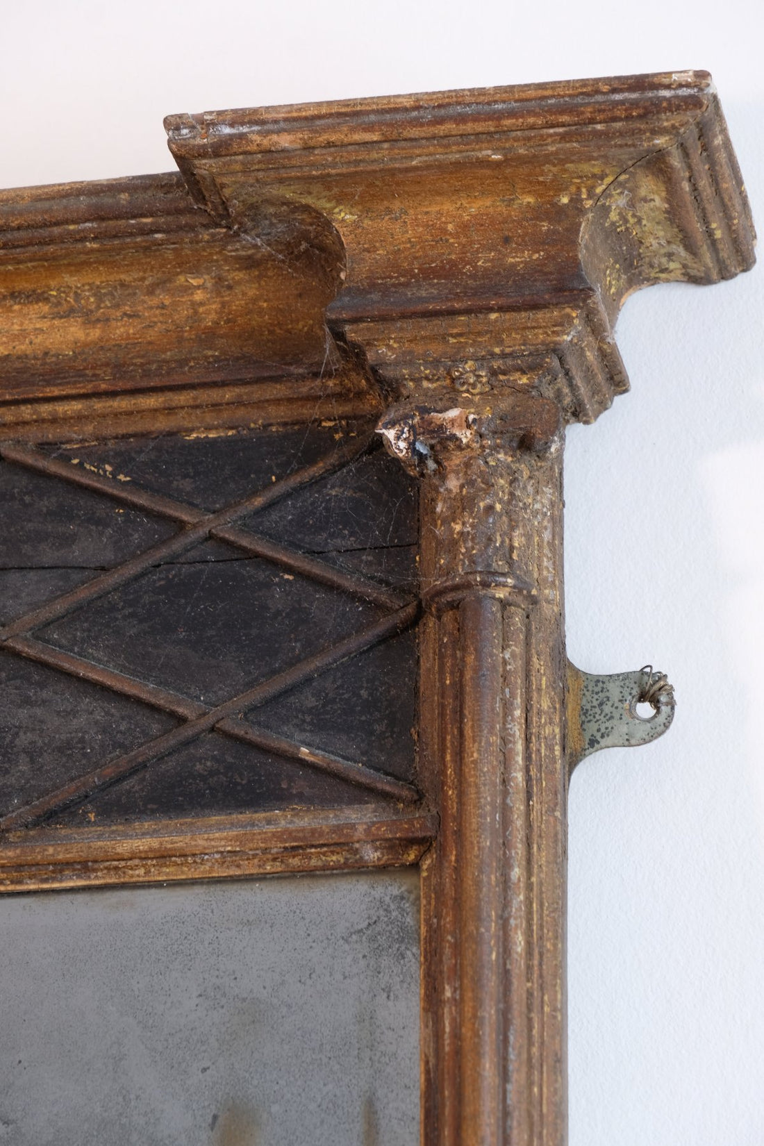 Regency pier mirror with original foxed bevelled glass and giltwood frame circa 1820s