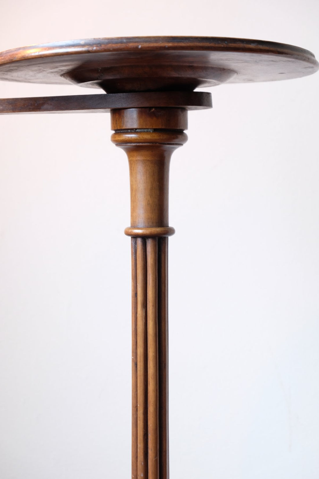 English Regency solid walnut candlestand table with burr walnut top and tulip-shaped sconce
