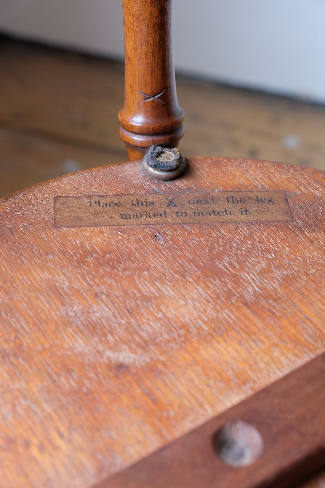 Original assembly instructions plus a location mark and original leather washers - William Gerrard mahogany cricket table with faux bamboo legs 